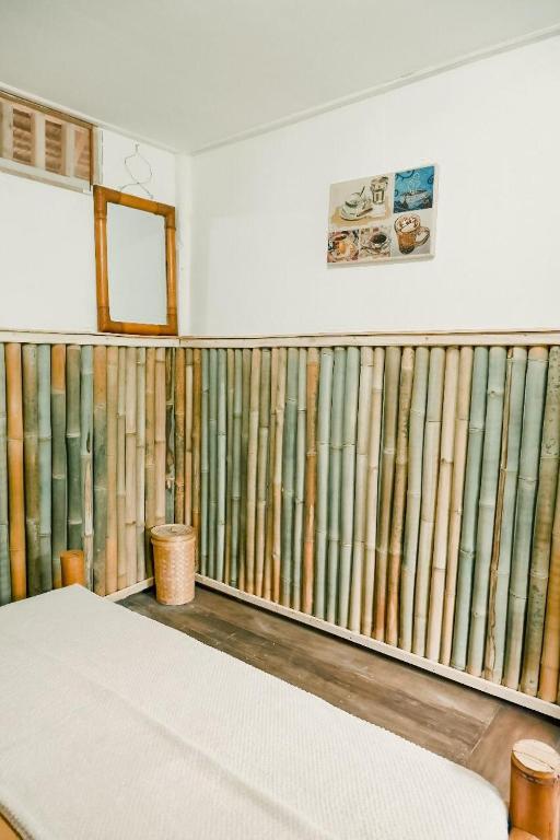 Postel nebo postele na pokoji v ubytování Backpacker Kawah Ijen