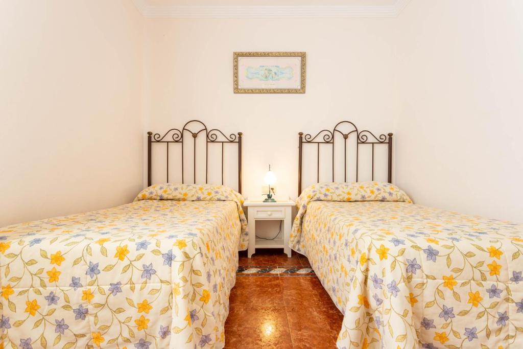 Posteľ alebo postele v izbe v ubytovaní Villa Jardín de Mari