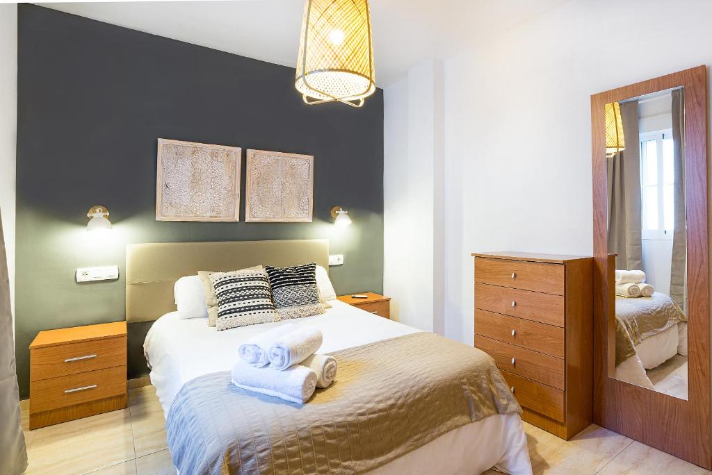 Posteľ alebo postele v izbe v ubytovaní Apartamento Fuente Olleta