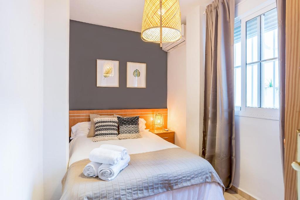 Posteľ alebo postele v izbe v ubytovaní Apartamento Fuente Olleta
