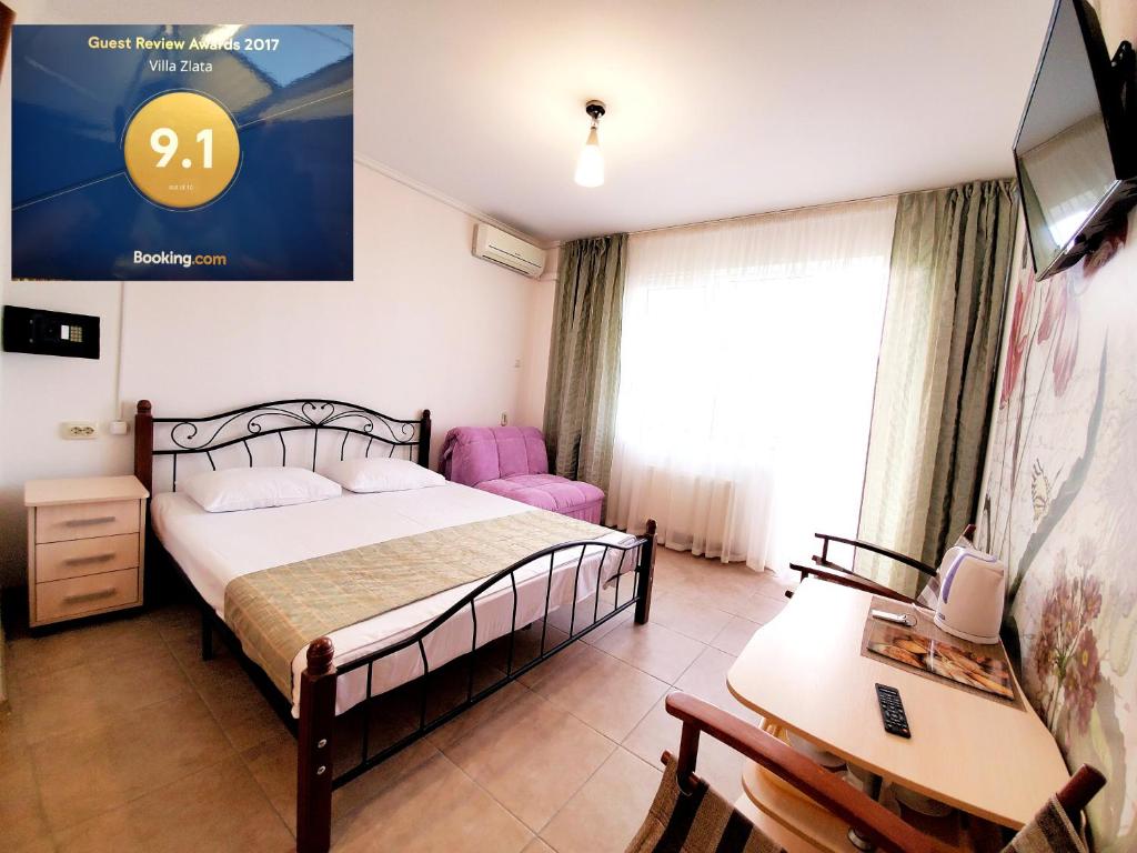 Postel nebo postele na pokoji v ubytování Villa Zlata