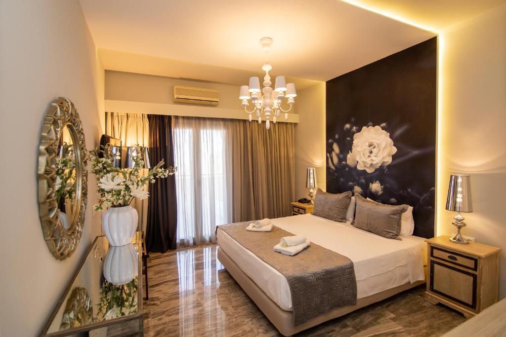 Кровать или кровати в номере Sunrise Resort Hotel