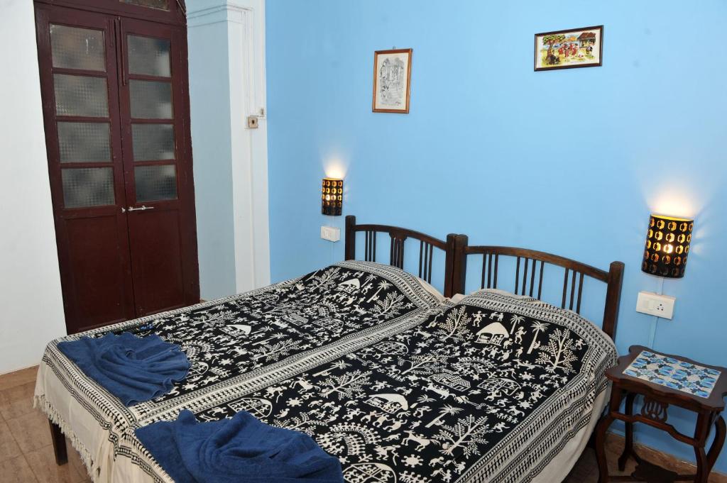 Postel nebo postele na pokoji v ubytování Vivenda Rebelo