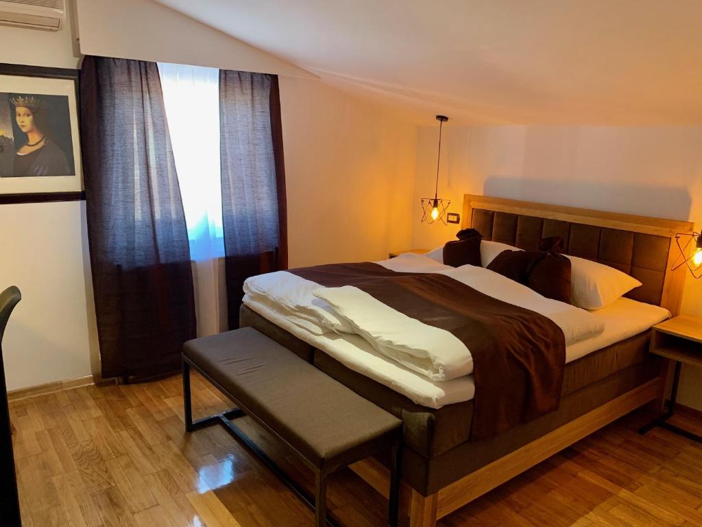 Кровать или кровати в номере Motel Kiwi