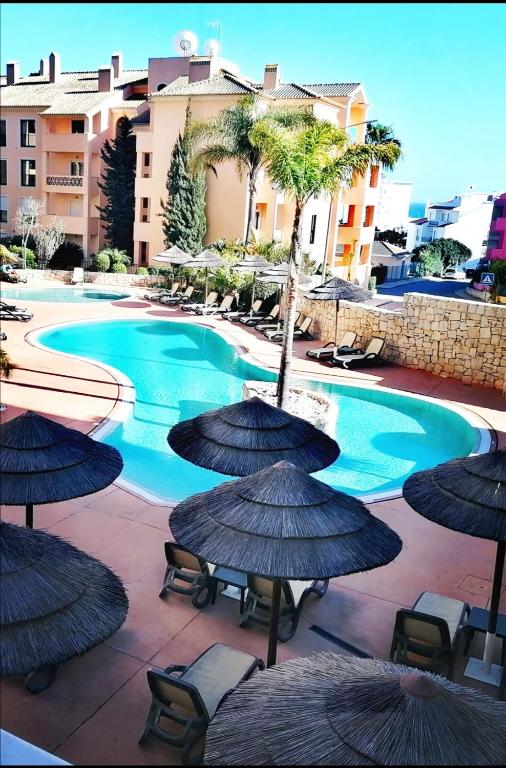 Bazén v ubytování Praia da Luz Monique Apartment nebo v jeho okolí