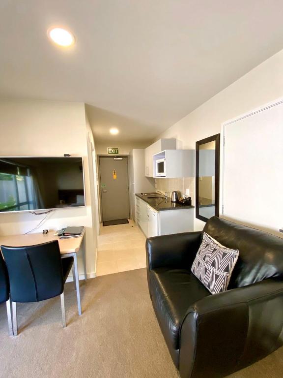 Kuchyň nebo kuchyňský kout v ubytování Alpha Motel with Spa-Bath