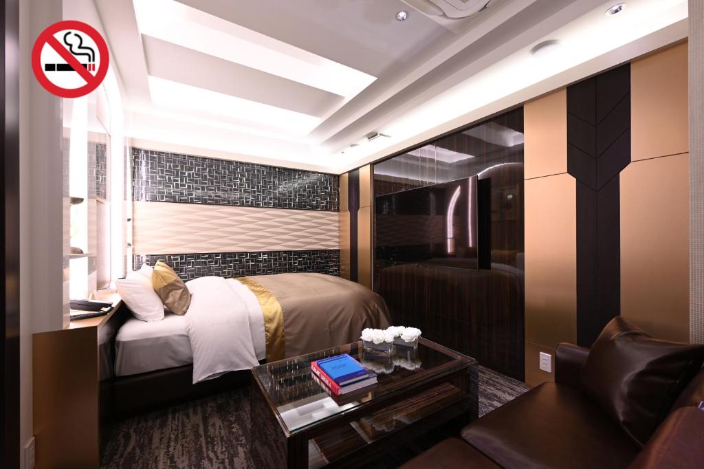Postel nebo postele na pokoji v ubytování HOTEL VARKIN ANNEX
