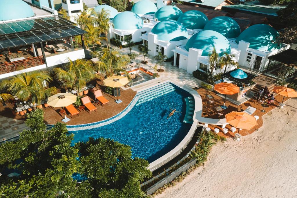 an aerial view of a resort with a swimming pool at Weekends El Nido Beach Resort in El Nido
