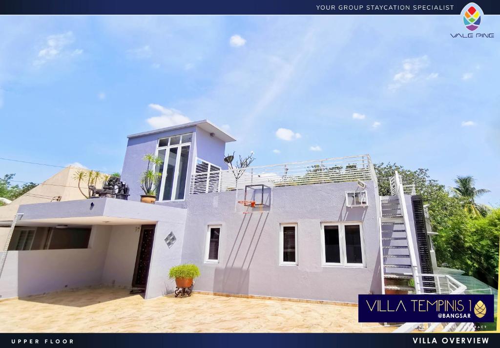 a white house with a staircase on top of it at Bangsar Grande Villa 23 by Vale Pine in Kuala Lumpur