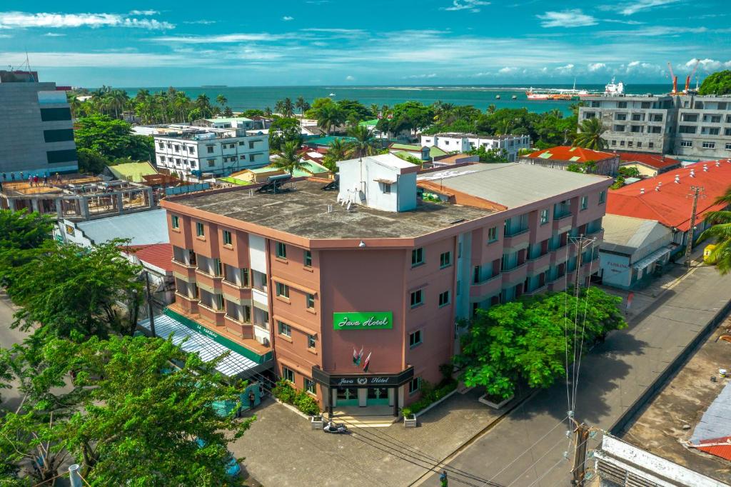 an overhead view of a building in a city at Java Hotel in Toamasina