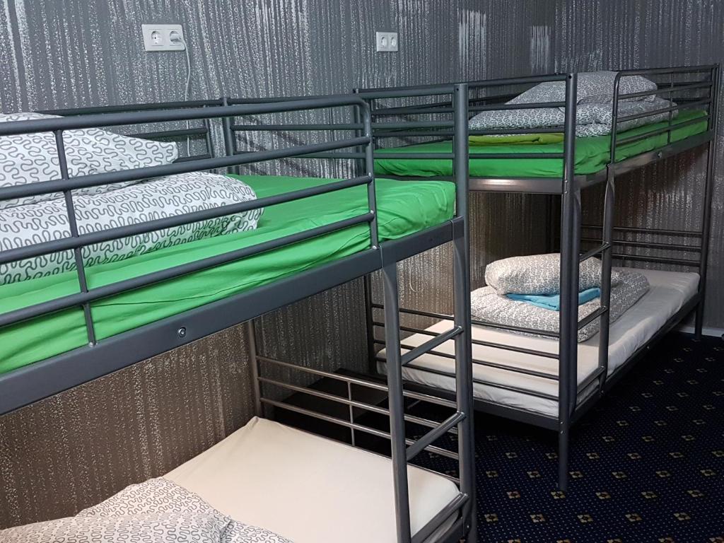 a couple of bunk beds in a room at Economy Hotel iProspali on Kurskaya in Moscow