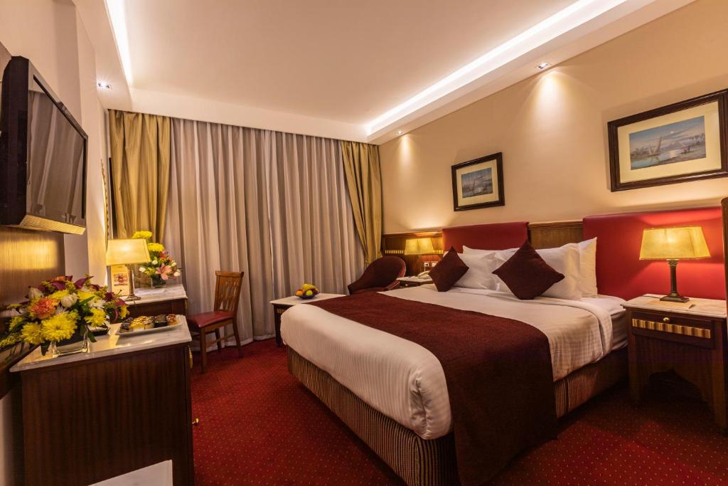 Llit o llits en una habitació de Hotel Flamenco Cairo