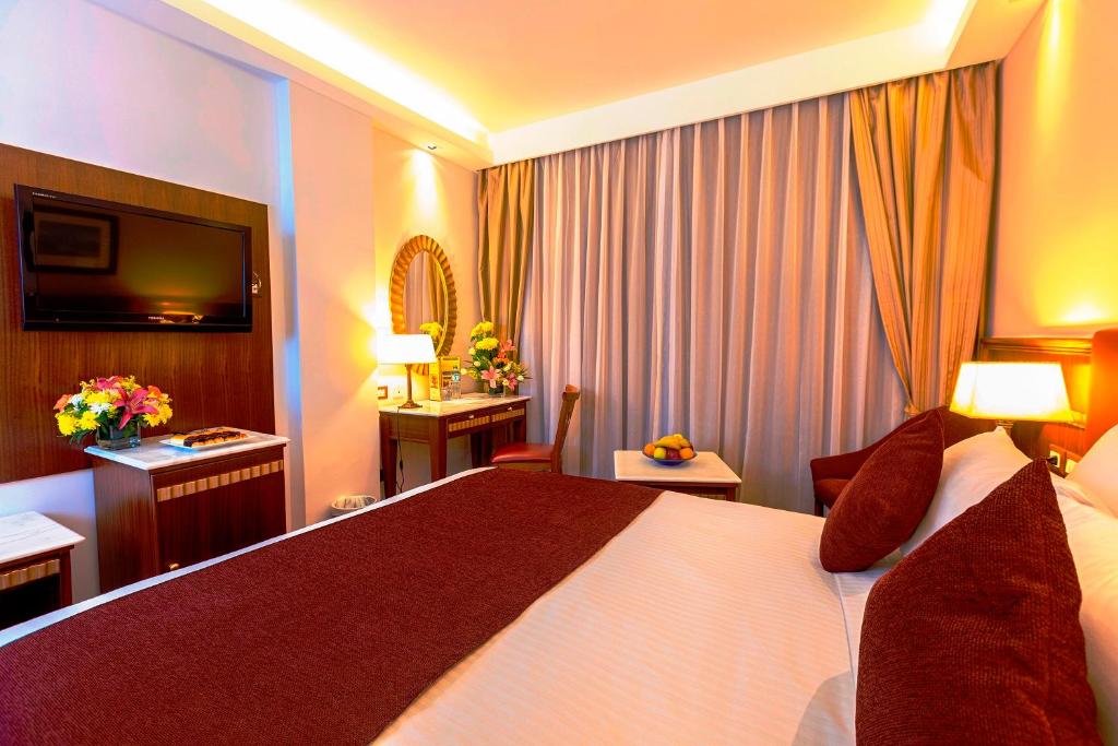 Llit o llits en una habitació de Hotel Flamenco Cairo