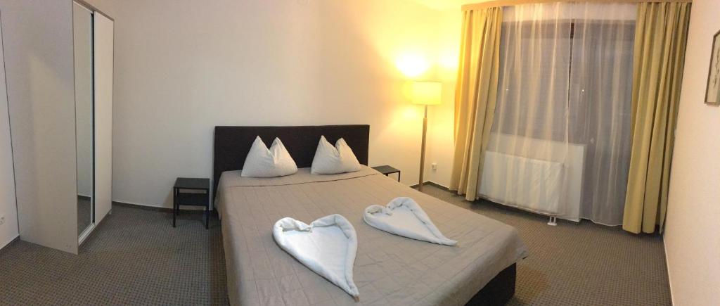 Postel nebo postele na pokoji v ubytování Ski Vital Apartments