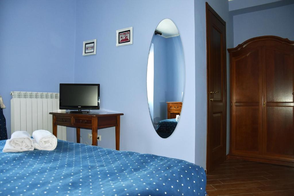 Posteľ alebo postele v izbe v ubytovaní Il Peperino GuestHouse