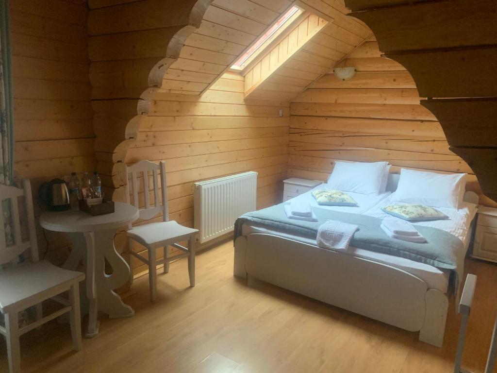 Postel nebo postele na pokoji v ubytování Villa "Затишна"