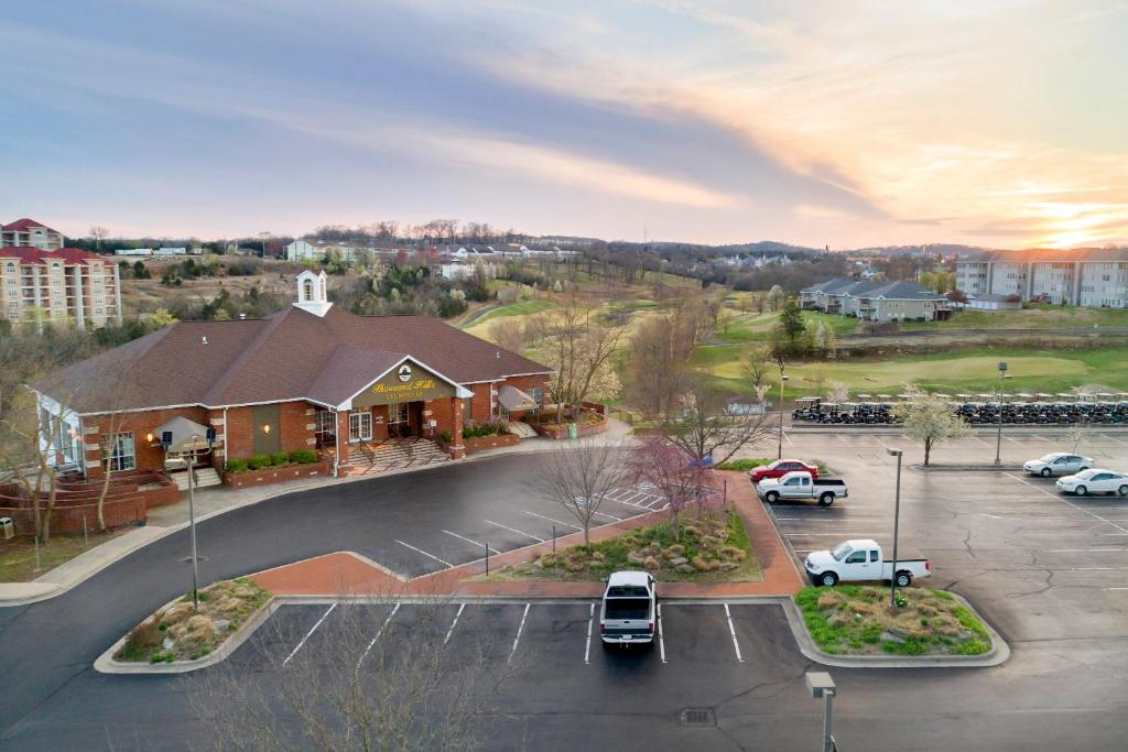 an aerial view of a parking lot with a building at Thousand Hills Golf Resort in Branson