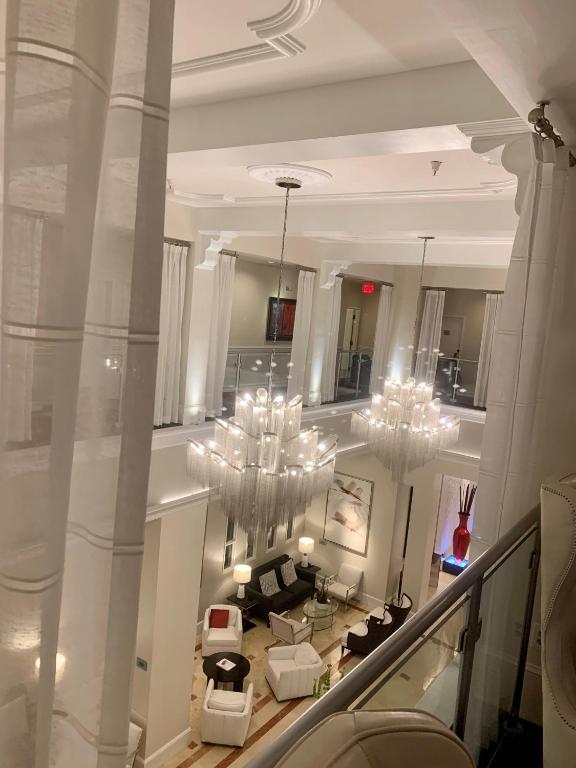 an overhead view of a living room with chandeliers at Inn On Fifth in Naples