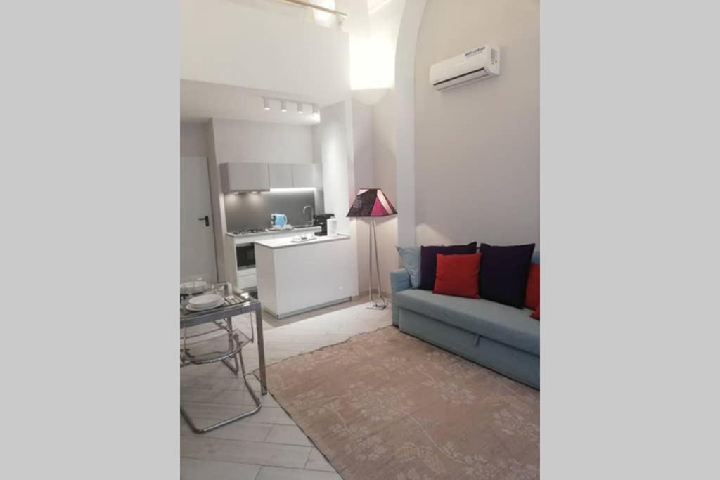 A seating area at Palazzo D'Arrigo White Loft