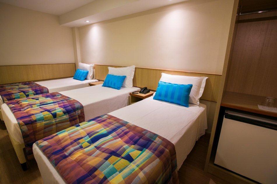 
Cama ou camas em um quarto em Lapa Ville Hotel

