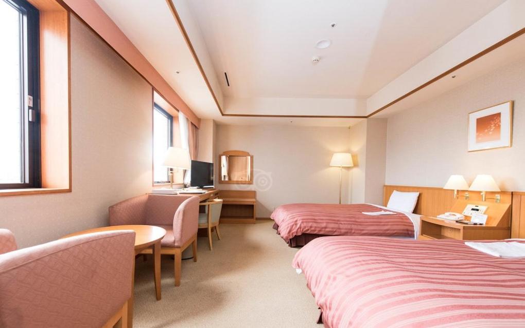 Postel nebo postele na pokoji v ubytování Hotel Mielparque Nagoya