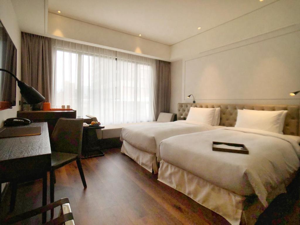 Postel nebo postele na pokoji v ubytování Hotel Mvsa+Michelin 2 Starred Molino de Urdàniz