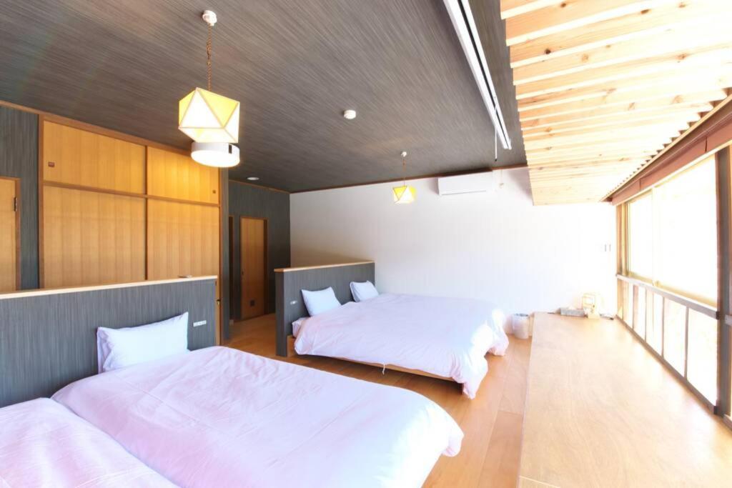 Postel nebo postele na pokoji v ubytování GOURA TERRACE