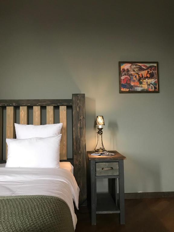 Postel nebo postele na pokoji v ubytování Apricot Hotel Yerevan