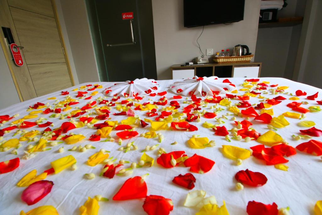 Postel nebo postele na pokoji v ubytování Ostro Hotel