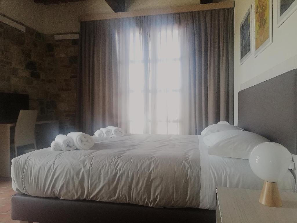 A bed or beds in a room at Villa Nadar