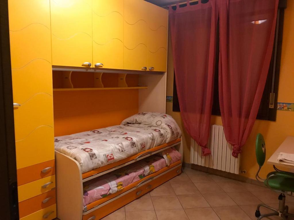 Postel nebo postele na pokoji v ubytování Il Grande Fiume
