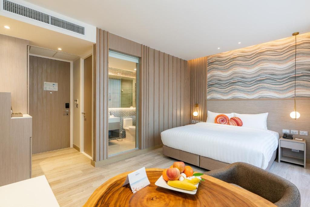 Postel nebo postele na pokoji v ubytování Maven Stylish Hotel Hua Hin