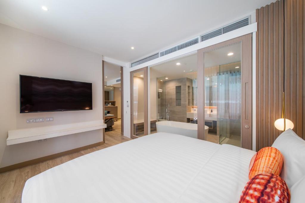 Postel nebo postele na pokoji v ubytování Maven Stylish Hotel Hua Hin