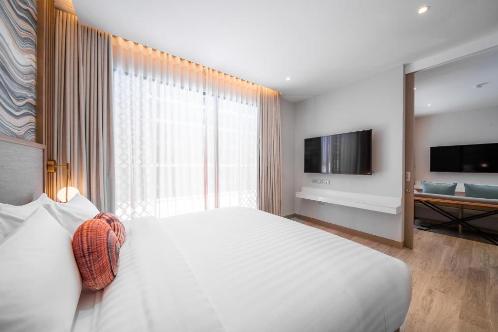 TV a/nebo společenská místnost v ubytování Maven Stylish Hotel Hua Hin