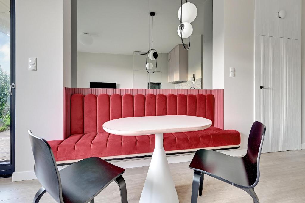 Posedenie v ubytovaní Flamingo Beach Apartment