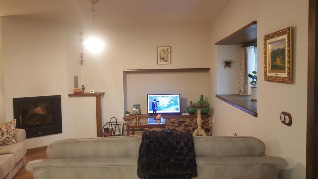 TV a/nebo společenská místnost v ubytování Casa Mila