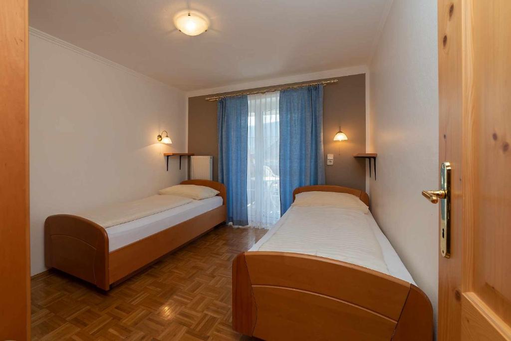 Postel nebo postele na pokoji v ubytování Bauernhof Liendl