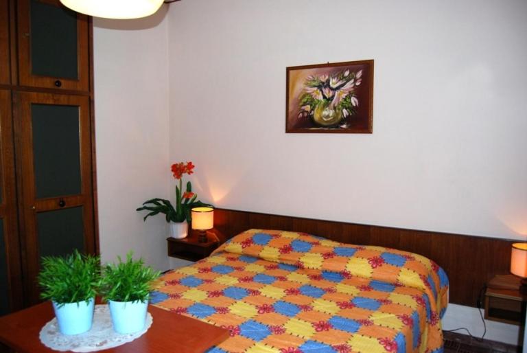 Un pat sau paturi într-o cameră la Casa Monti