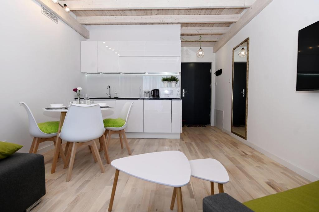 Kuchyň nebo kuchyňský kout v ubytování Apartament Nadmorskie Wzgórze