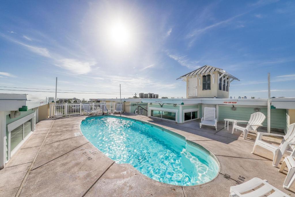 a swimming pool on the roof of a building at Tybee Escape in Tybee Island