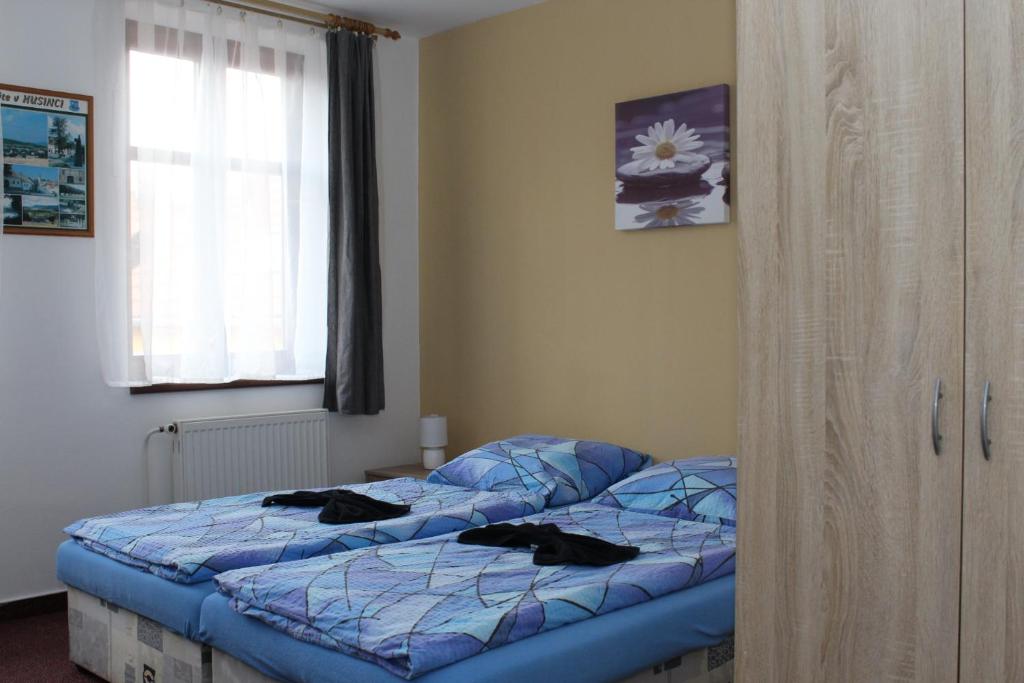 Postel nebo postele na pokoji v ubytování Penzion u Blanice