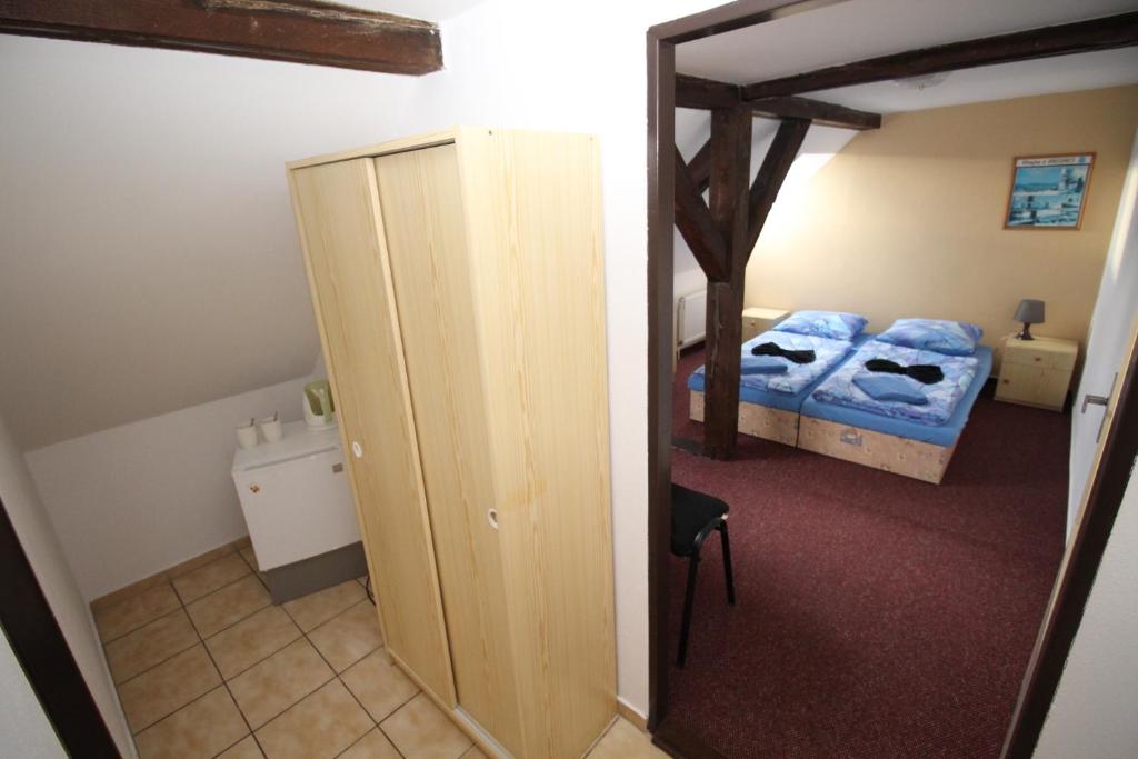 Postel nebo postele na pokoji v ubytování Penzion u Blanice