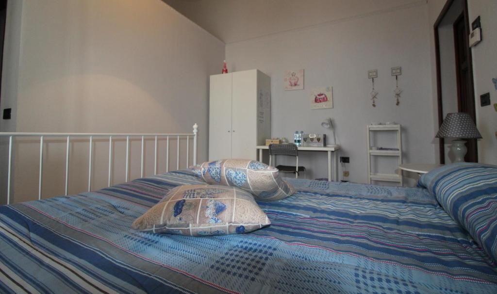 Postel nebo postele na pokoji v ubytování Le Cascine