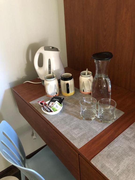 Příslušenství pro přípravu čaje a kávy v ubytování Rent apart Las Condes