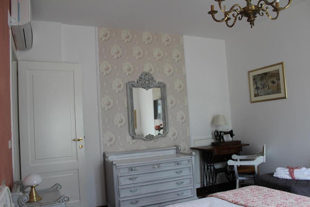 Łóżko lub łóżka w pokoju w obiekcie B&B Villa Lilla