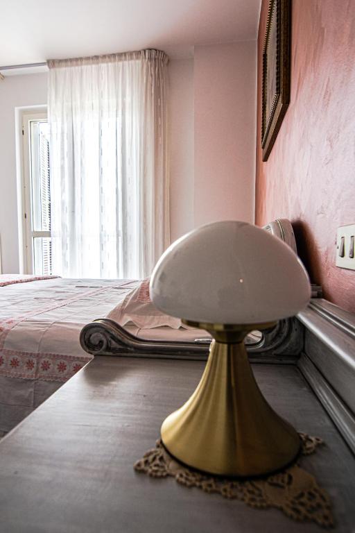 Łóżko lub łóżka w pokoju w obiekcie B&B Villa Lilla