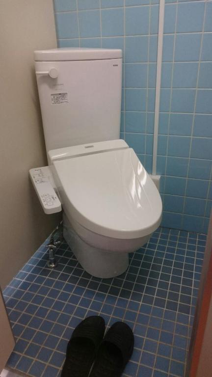 Koupelna v ubytování Takigawa Ryokan