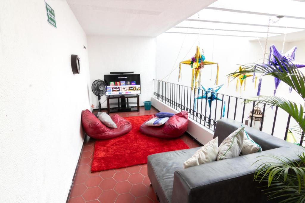 Posezení v ubytování Hostal Casa Colores Adults Only