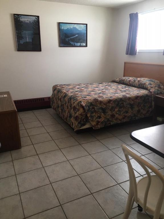 Postel nebo postele na pokoji v ubytování Almada Inn