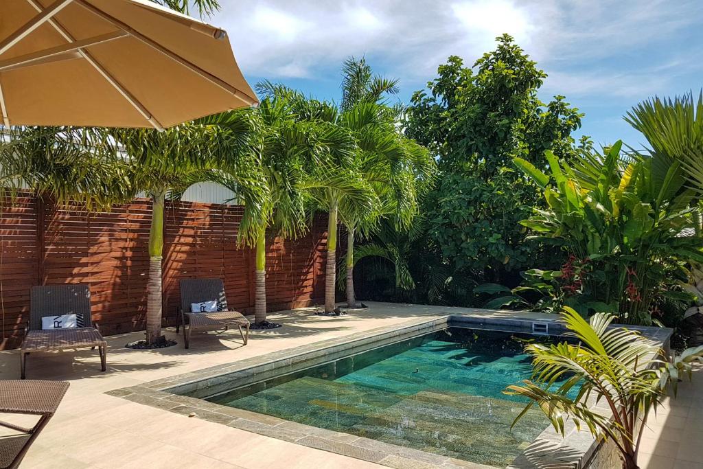 The swimming pool at or close to Villa Oasis